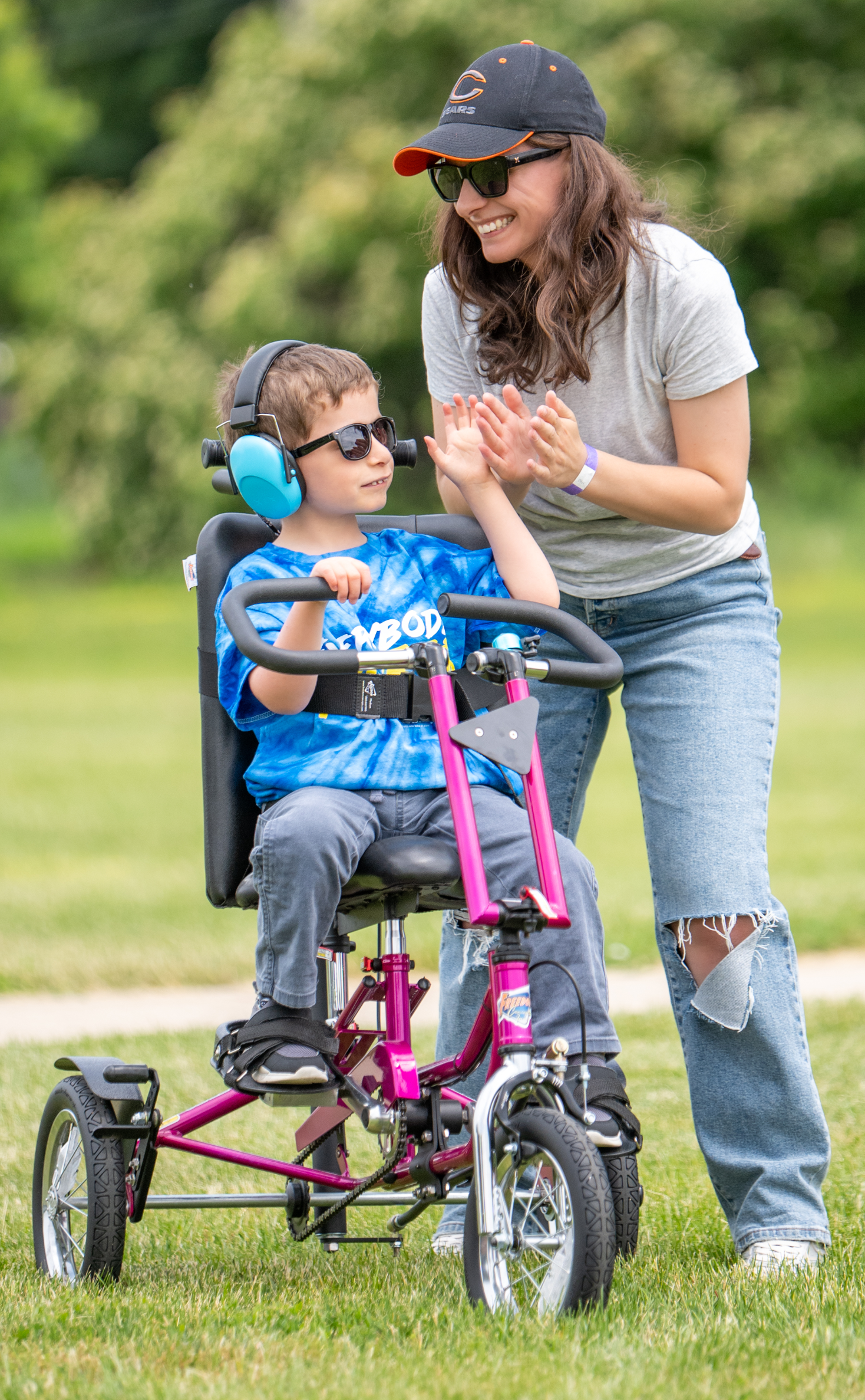 Matthew and his mom with his new adaptive bike